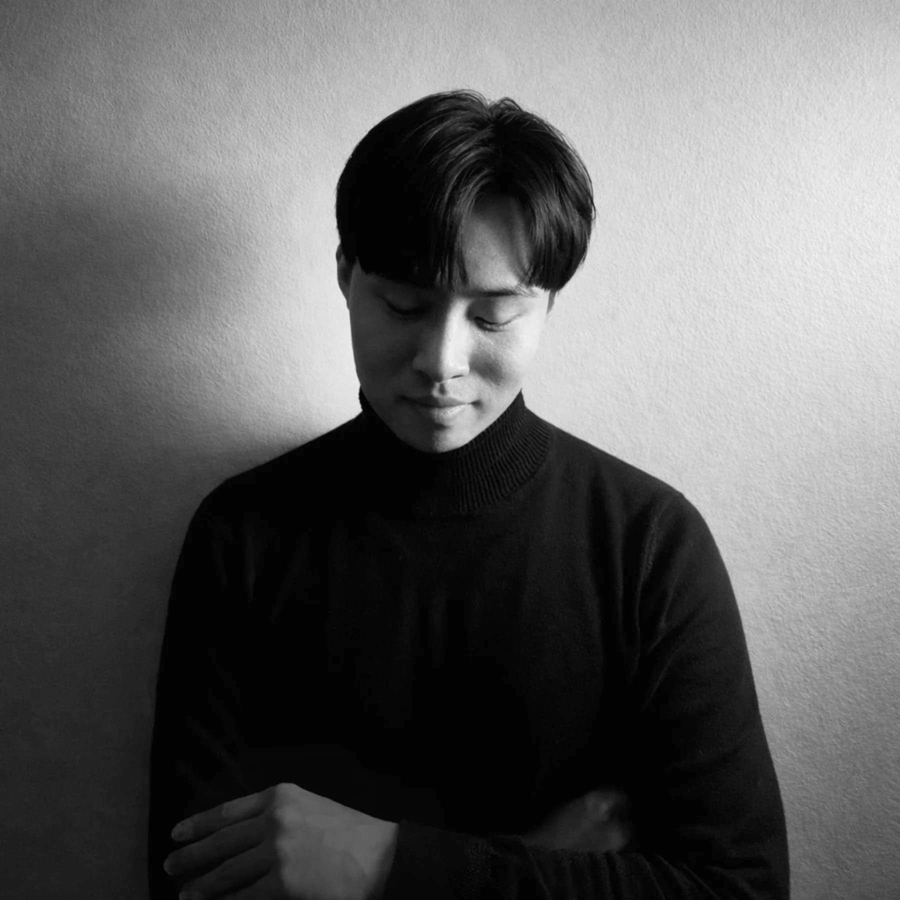 Black and white portrait of Aaron Isaiah Liu
